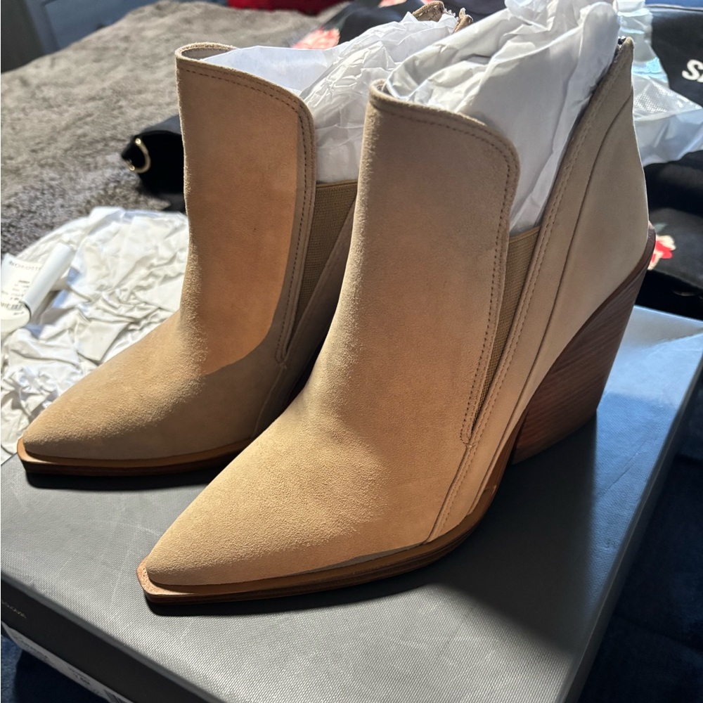 New never worn Vince Camuto boots. Low cut and real cute with jeans.